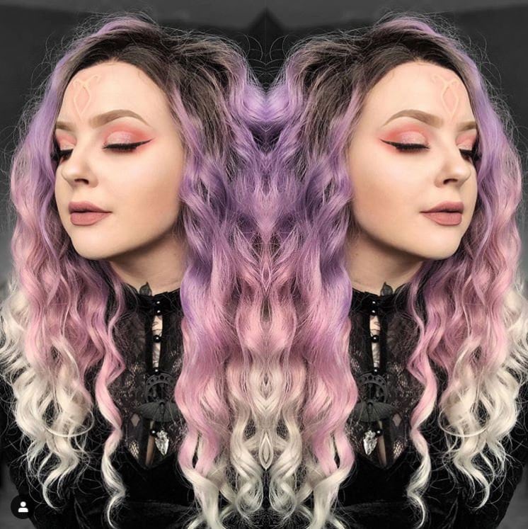 Two women in pastel purple long hair and an Angel Rune on the forehead in vanilla shade.