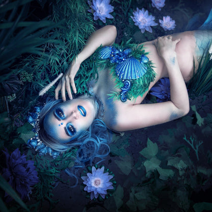 Blue mermaid wearing ruffle gills
