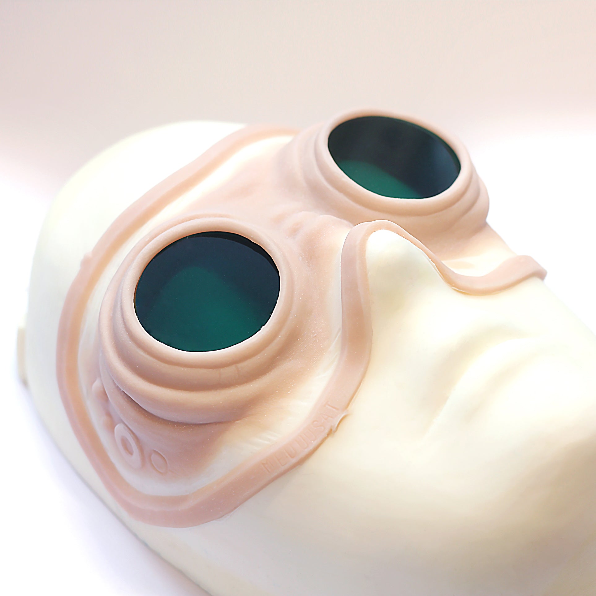 Steampunk Goggles - Silicone makeup prosthetic in vanilla shade on a white surface